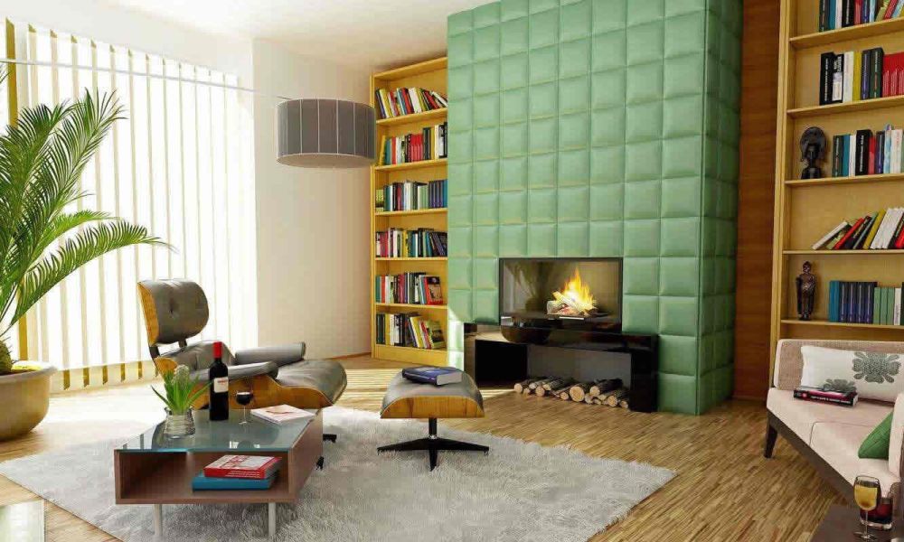 A living room with a green upholstered wall, a cozy fireplace, bookshelves, and modern furniture, creating a warm and stylish environment.